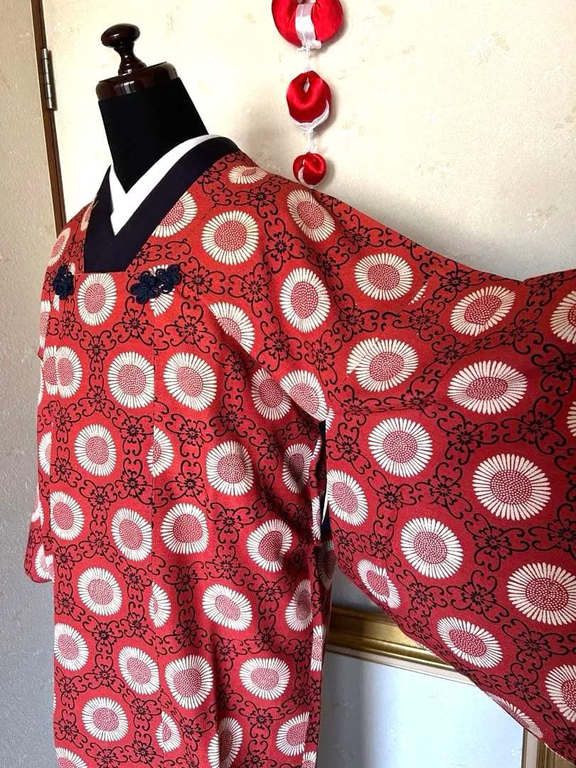 Michiyuki coat in Liberty print-like fabric with a tassel at the chest